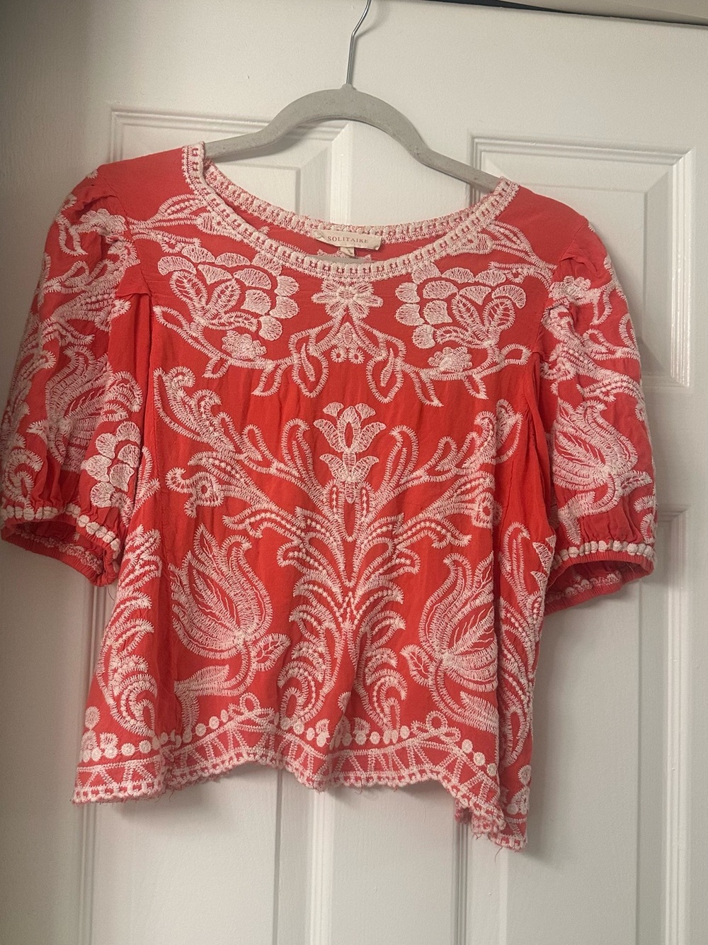 Solitaire Coral Red Blouse with White Floral Embroidery